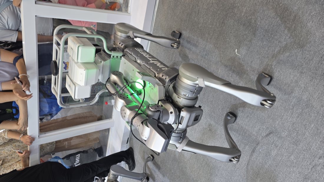 Industrial quadruped robot with robotic arm at WRC 2026
