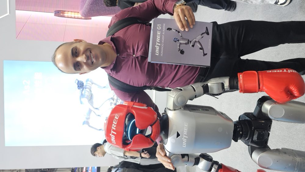 Rachid Atouli with Unitree G1 humanoid at WRC 2026