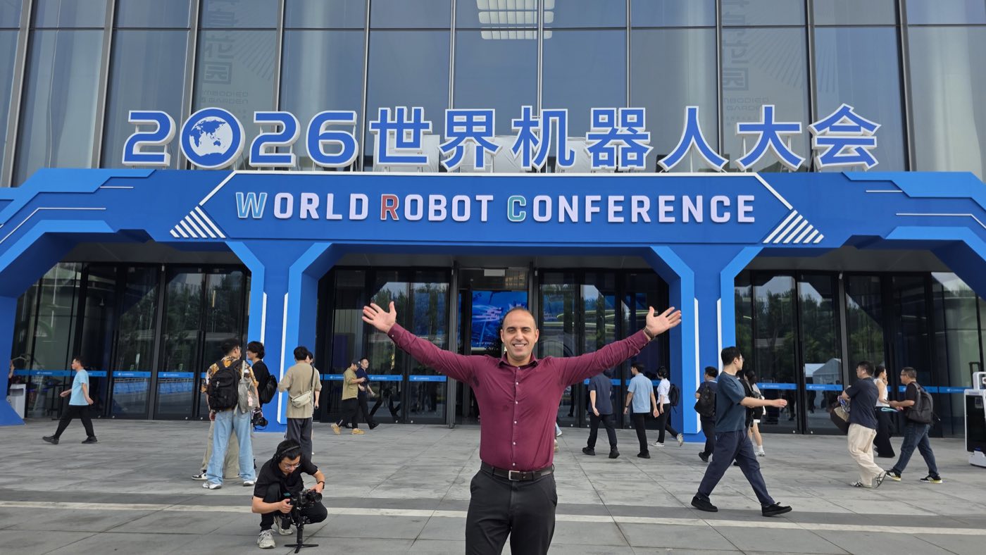 Rachid Atouli at the World Robot Conference 2026 entrance, Beijing